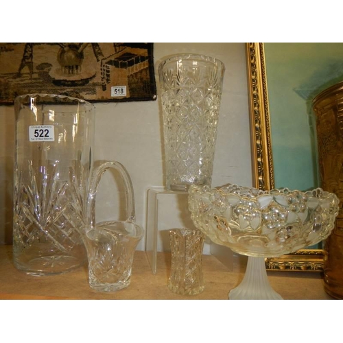 522 - Two cut glass vases, a cut glass basket and a moulded glass vase. COLLECT ONLY.