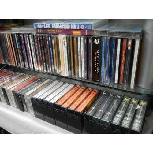 531 - A quantity of DVD's, CD's and cassette tapes.