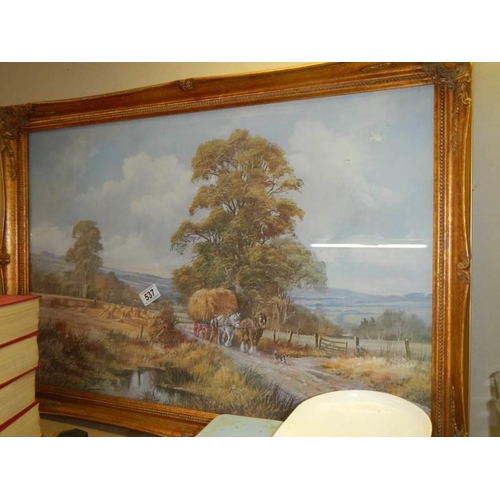 537 - A large gilt framed print featuring heavy horses hay making, COLLECT ONLY.