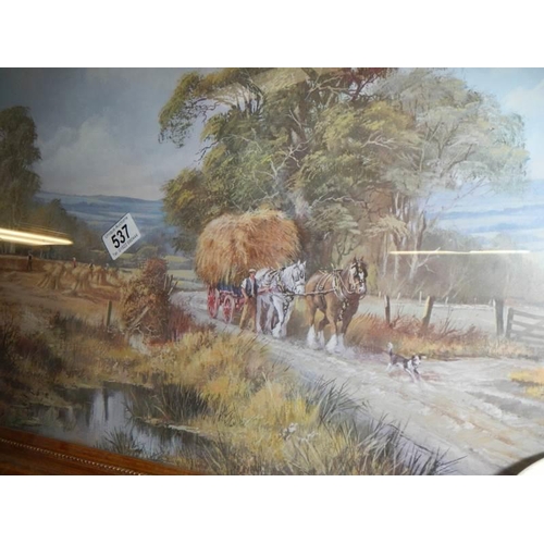 537 - A large gilt framed print featuring heavy horses hay making, COLLECT ONLY.