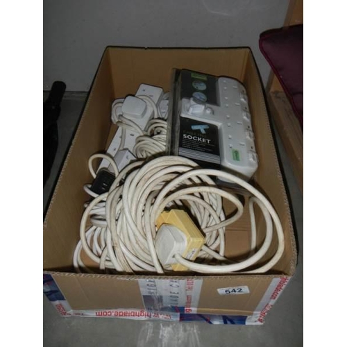 542 - A box of extension leads.