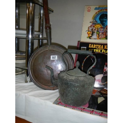 557 - A Victorian copper kettle and a warming pan, COLLECT ONLY.