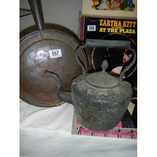 557 - A Victorian copper kettle and a warming pan, COLLECT ONLY.