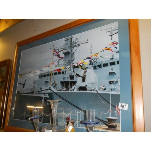 581 - A large pine framed print of a battle ship, COLLECT ONLY.