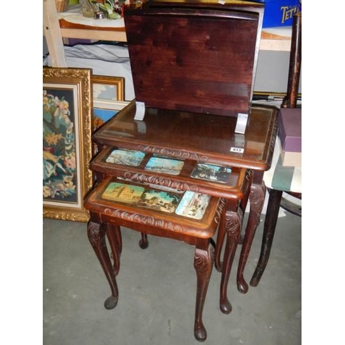 613 - A nest of three glass top tables and a magazine rack. COLLECT ONLY.