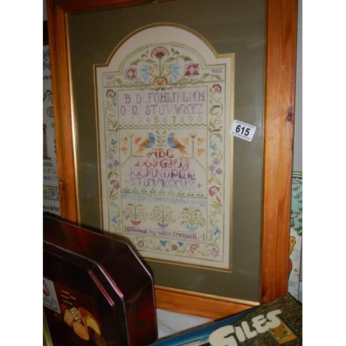 615 - Two large framed and glazed samplers, one dated 2004. COLLECT ONLY