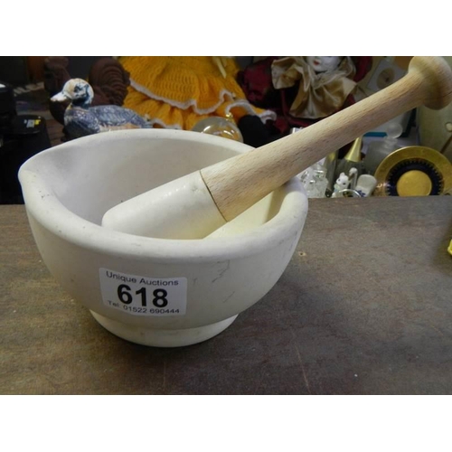 618 - An acid proof pestle and mortar.