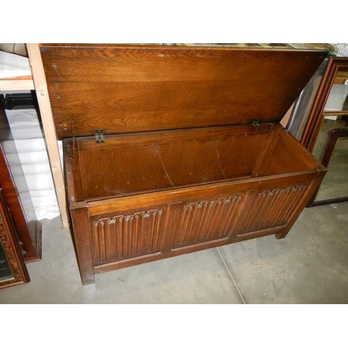 631 - A 1950's oak linenfold blanket box, COLLECT ONLY.