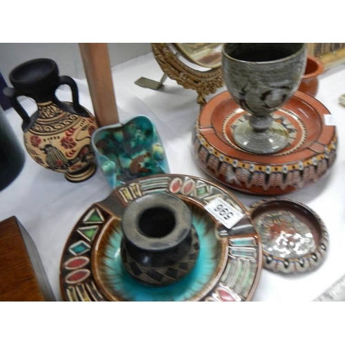 596 - Two vintage terracotta ashtrays and one other.