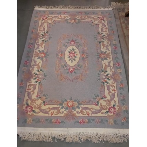 742 - A grey & beige rug - 212cm x 124cm (including tassels) COLLECT ONLY