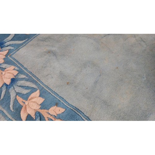 743 - A blue coloured rug (few marks on) - 185cm x 122cm COLLECT ONLY