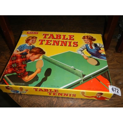 672 - A vintage boxed Merit table tennis set.