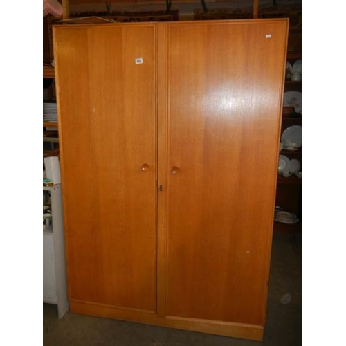 682 - A retro light oak double wardrobe, COLLECT ONLY.