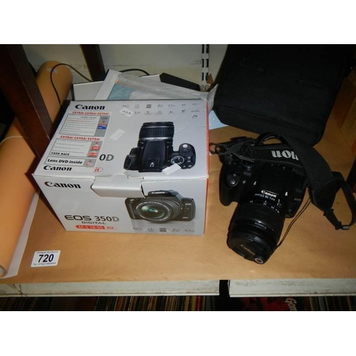 720 - A Canon EOS 350D digital camera, bag, accessories and photo cube.