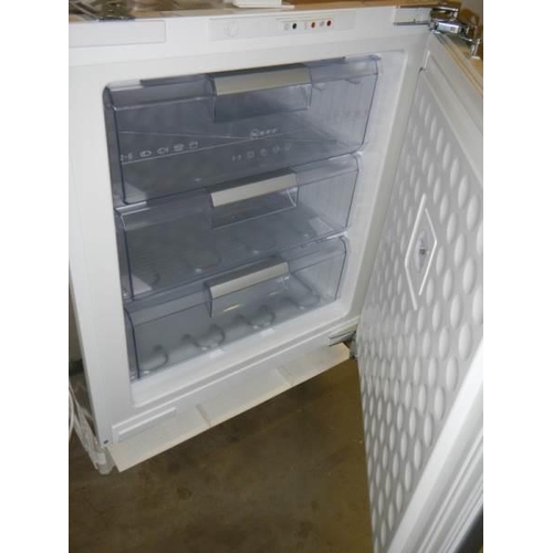 771 - An under counter freezer, COLLECT ONLY.