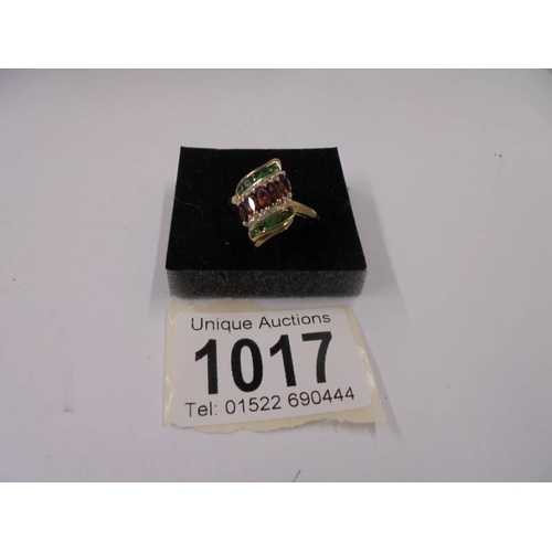 1017 - A yellow gold diamond, ruby and emerald ring, size R Half, 2.7 grams.