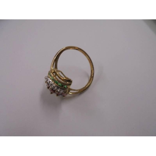 1017 - A yellow gold diamond, ruby and emerald ring, size R Half, 2.7 grams.