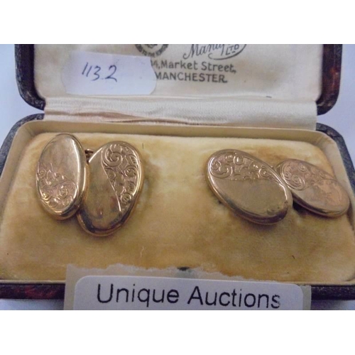 1027 - A cased pair of 9ct gold cuff links, 3.35 grams.