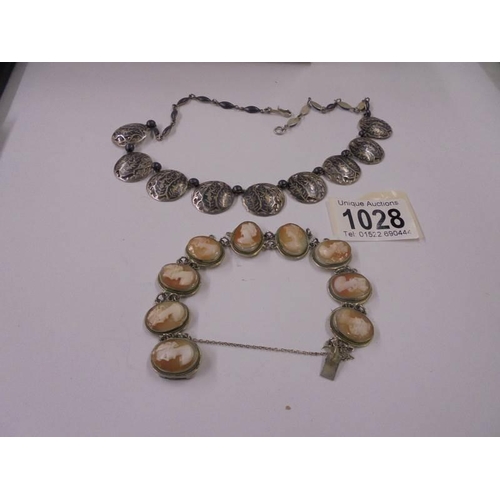 1028 - A Siamese silver necklace and a silver cameo bracelet.