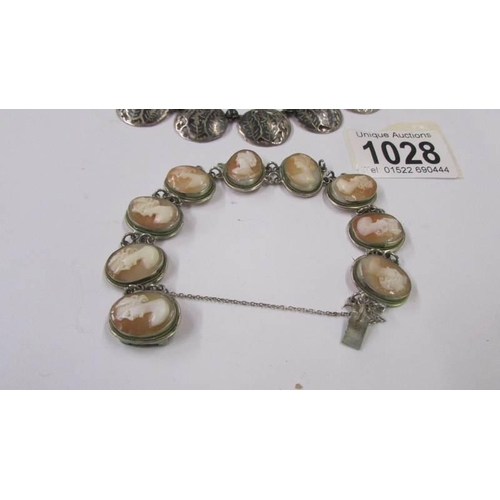 1028 - A Siamese silver necklace and a silver cameo bracelet.