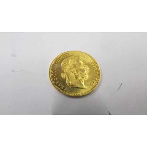 1033 - A 1915 Franc IOS I-D-G Avstriae Imperator pure gold coin, 3.5 grams.