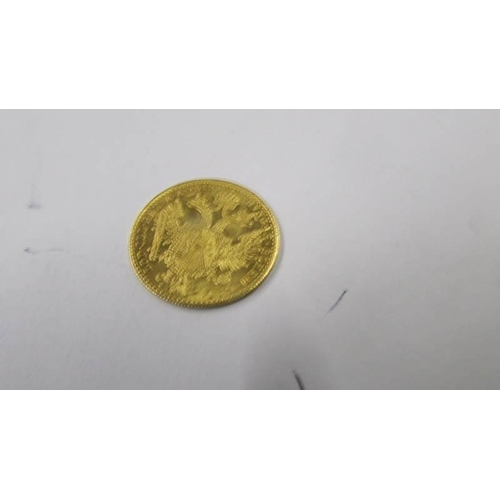 1033 - A 1915 Franc IOS I-D-G Avstriae Imperator pure gold coin, 3.5 grams.