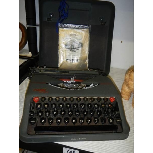 745 - An Empire Aristocrat portable typewriter, COLLECT ONLY.