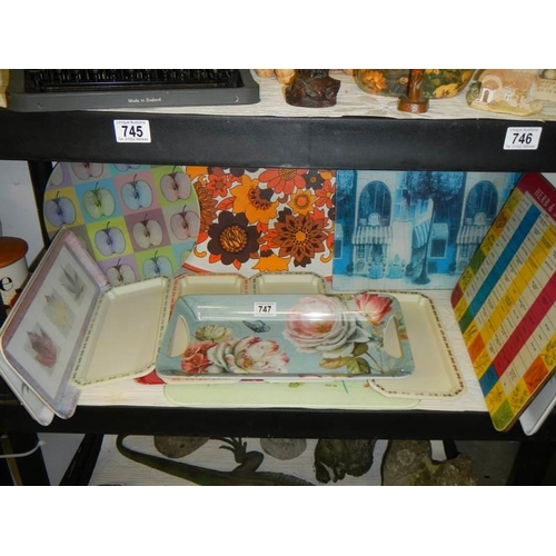 747 - A shelf of assorted plastic trays etc., COLLECT ONLY.