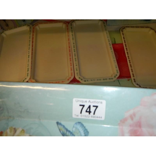 747 - A shelf of assorted plastic trays etc., COLLECT ONLY.