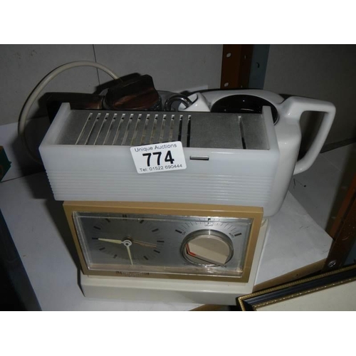 774 - A mid 20th century teasmade, complete, COLLECT ONLY.