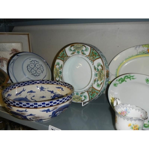 776 - A mixed lot including framed and glazed oriental picture, ceramics etc.,