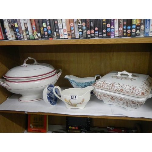 815 - Two tureens, two gravy boats and a ladle.