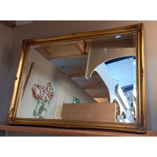 1 - A gilt framed mirror - 100cm x 70cm. COLLECT ONLY