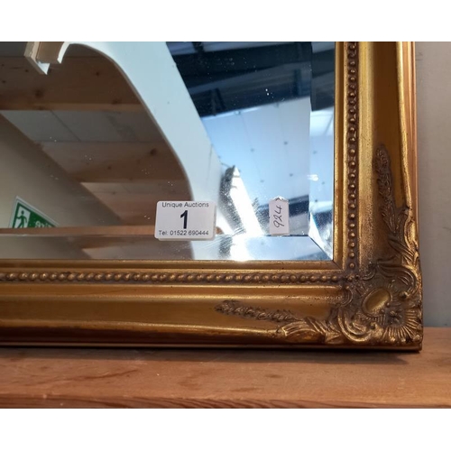 1 - A gilt framed mirror - 100cm x 70cm. COLLECT ONLY