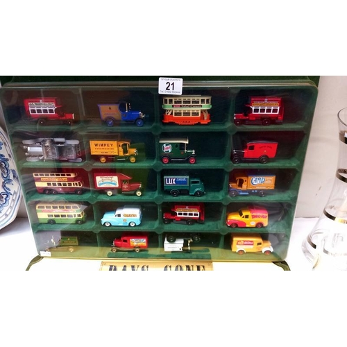 21 - A quantity of Lledo die cast models & a Franklin Mint Rolls Royce in 2 Days Gone shop display cabine... 