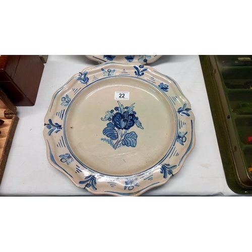 22 - Three Delft style blue and white plates.