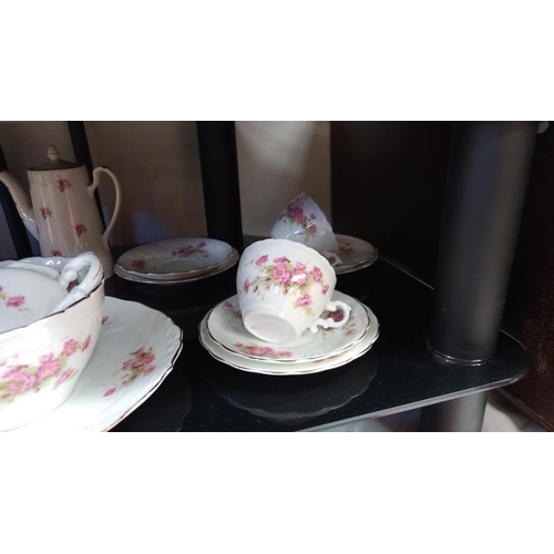 25 - A quantity of cups & saucers & part tea set (2 shelves) COLLECT ONLY