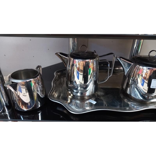 31 - A Swan brand tea set (teapot, hot water, milk & sugar) & a tray