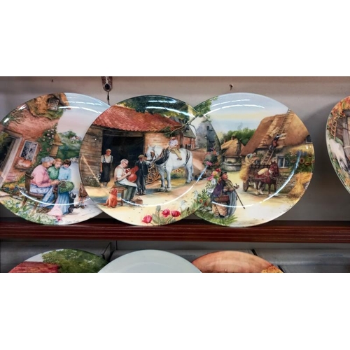 36 - A set of 12 boxed Royal Doulton collectors plates 'Old country crafts' & a display shelf.  COLLECT O... 