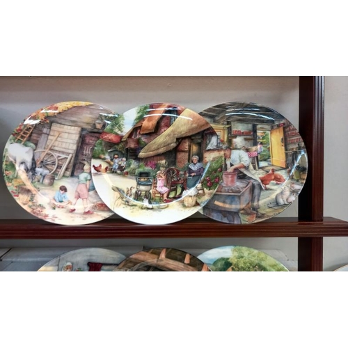 36 - A set of 12 boxed Royal Doulton collectors plates 'Old country crafts' & a display shelf.  COLLECT O... 