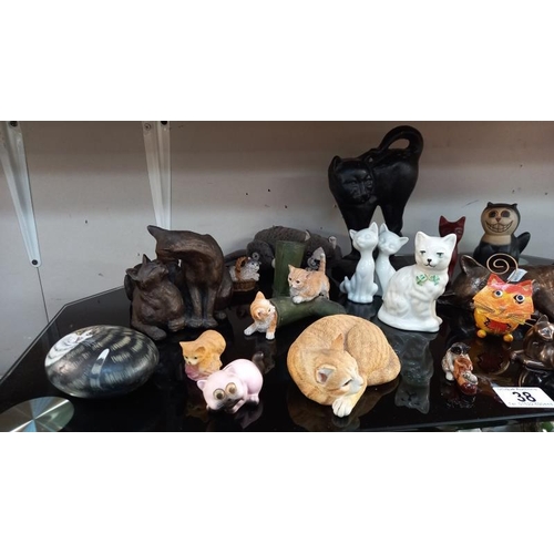 38 - A quantity of cat ornaments including Belleek, Country Artists, Sherratt & Simpson etc plus a cast i... 