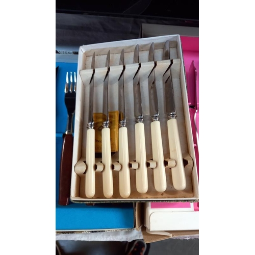 40 - 4 boxed lots of cutlery