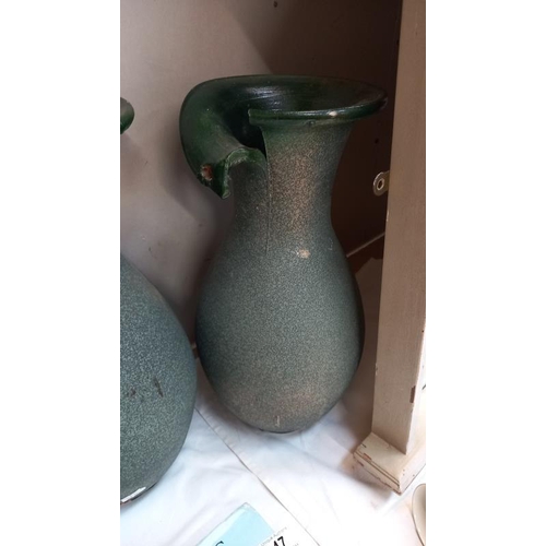 46 - A pair of vases (made in a damaged fashion)