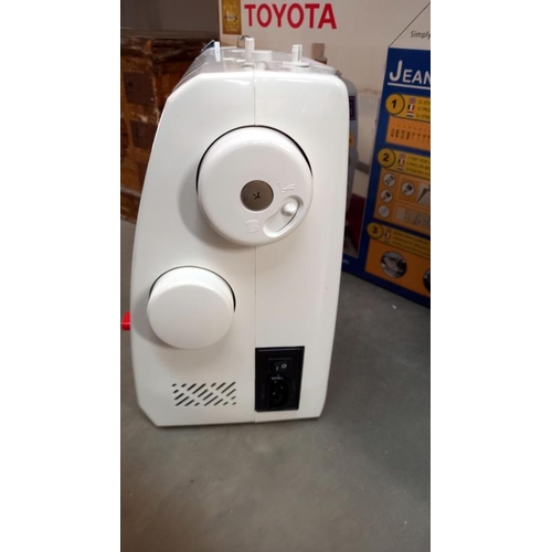 6 - A boxed Toyota JS021 sewing machine. COLLECT ONLY