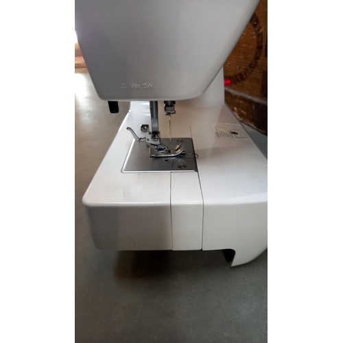 6 - A boxed Toyota JS021 sewing machine. COLLECT ONLY