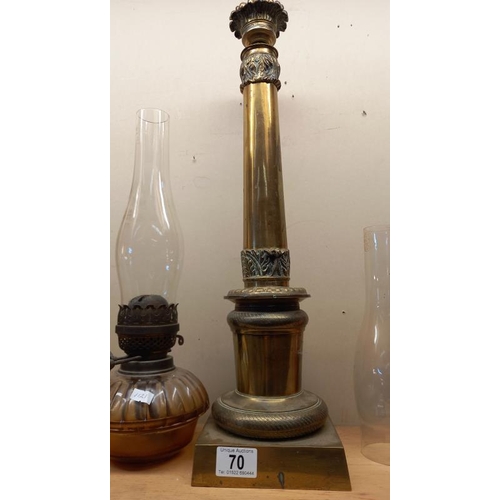 70 - A Victorian brass oil lamp column, cut glass drop in font & 2 chimneys