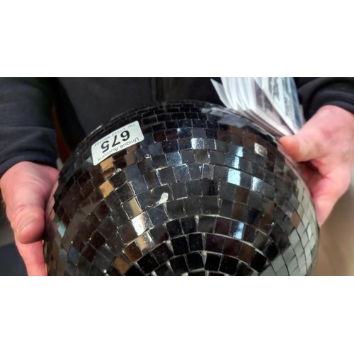 675 - An unusual black disco glitter ball.