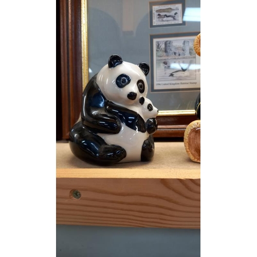 107 - A wade panda, Tetley money box & 1 other