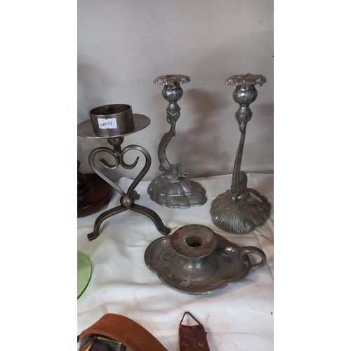 130 - A pair of 1930's oak barley twist candlesticks, a pair of serpent candlesticks & 3 others