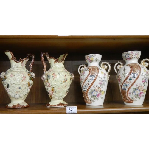 821 - Two pairs of early 20th century vases.